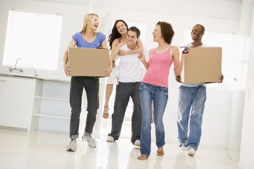 Flat removals in Paddington with moving team near apartment entrance
