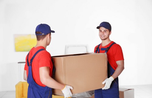 Packed moving boxes prepared for a Paddington house relocation