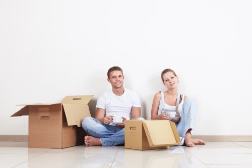 Professional movers transporting furniture during a Paddington relocation