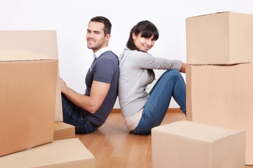 Local packing team handling fragile items during a move in Paddington
